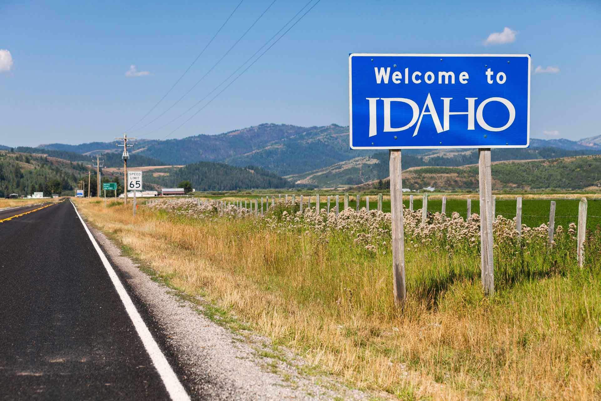 The welcome to Idaho sign you see as you move to Eagle, ID using the best real estate agents.
